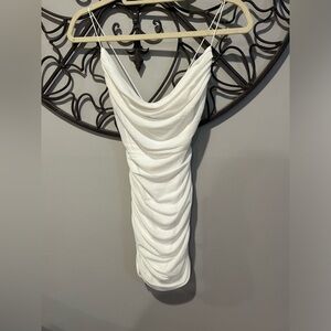 White garage, mini body con swoop neck, dress with inner lining worn once XS